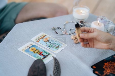 Photo for A woman is making tarot layout on the table. High quality photo - Royalty Free Image