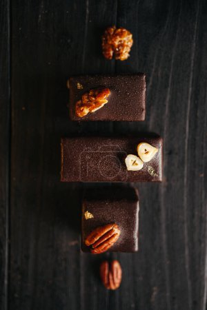 Halva at dark background with nuts. High quality photo