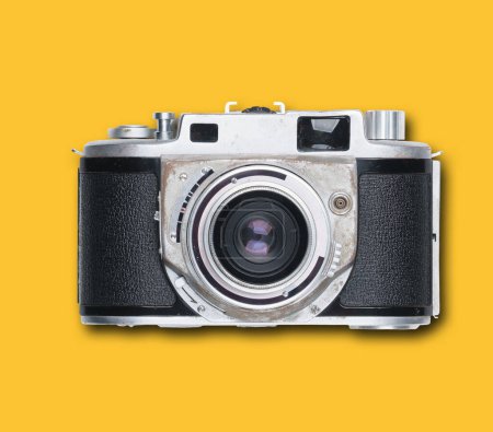 Photo for Vintage old film camera on yellow background with shadow - Royalty Free Image