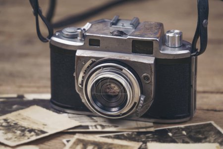 Photo for Vintage camera on the background of old photos - Royalty Free Image