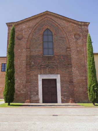 Photo for The distinctive red brick facade of the Guinigi Chapel in the Piazza San Francesco in Lucca, Tuscany, Italy. - Royalty Free Image