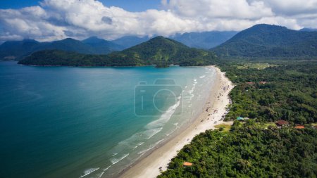 Photo for Beach landscape on a sunny day, seen from above, drone photography, calm turquoise waters, mountains with forest, tropical, river, nature, travel, Praia do Ubatumirim - Ubatuba - Sao Paulo - Brazil - Royalty Free Image