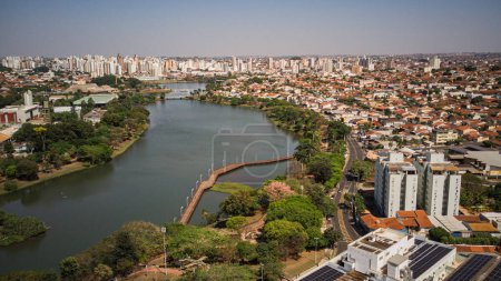 Photo for Aerial view of the Rio Preto municipal dam in drone panorama, aerial view on a sunny day with the avenues and highways and the park and the river in high resolution - Sao Jose do Rio Preto - Sao Paulo- Brasil - Royalty Free Image