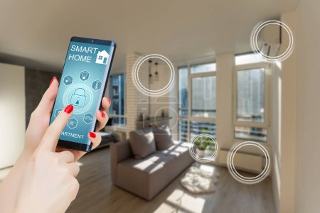 Photo for Controlling home heating temperature with a smart home, close-up on phone. Concept of a smart home and mobile application for managing smart devices at home. - Royalty Free Image