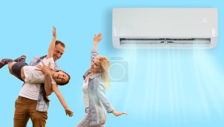 Photo for Happy Family Under Air Conditioning. - Royalty Free Image
