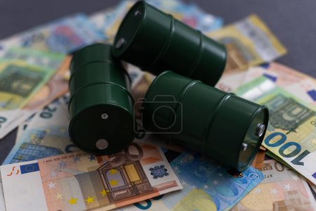 Photo for Oil barrel with money, euro banknotes closeup. - Royalty Free Image