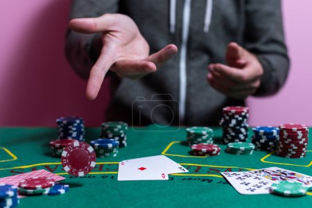Photo for Man playing blackjack at the table. - Royalty Free Image