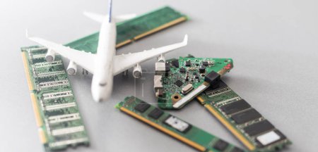 Foto de Computer chips and a toy airplane. - Imagen libre de derechos