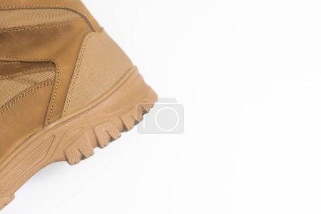 Foto de Boots isolated on white. Steel cap leather boots isolated on white. combat men boot, Military boots at Through use. With clipping path. - Imagen libre de derechos