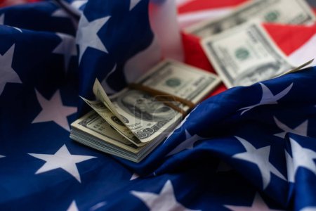 American flag and banknotes dollar.