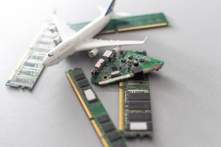Foto de Computer chips and a toy airplane. - Imagen libre de derechos