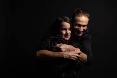 Photo for Loving daddy look at little adorable daughter feeling love isolated on studio background profile faces side view, deep devotion warm relationships, love care, closest person, fathers day concept. - Royalty Free Image