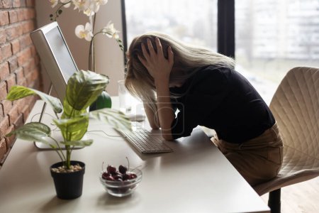 Stressed businesswoman, woman sad, desktop