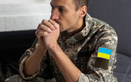 ukrainian man, sodier. Mental health. Nervous male military suffering depression, PTSD concept. Man sad, have problems. Psychology concept. Stress and pain