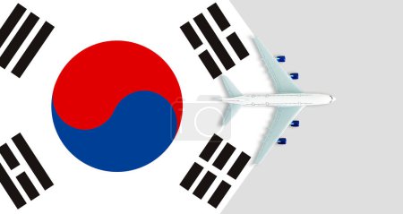 Téléchargez les photos : Drapeau de la Corée du Sud et l'avion. Le concept de voyage. Avion jouet sur le drapeau de la Corée du Sud - en image libre de droit