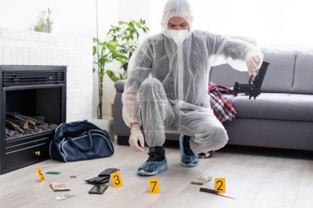 Photo for Forensics researcher photographing a blood at a murder scene. High quality photo - Royalty Free Image