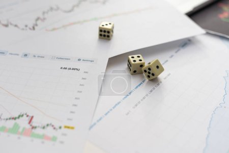 Photo for Dices cubes to trader. Cubes with the words SELL BUY on financial chart as background. Selective focus. High quality photo - Royalty Free Image