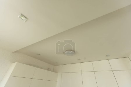 Photo for Clean gypsum board ceiling in construction site. Under construction a new house with interior modern style. High quality photo - Royalty Free Image