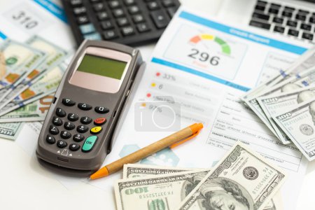 Photo for Poor credit score report with pen and calculator. High quality photo - Royalty Free Image