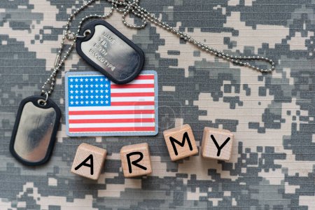 Photo for Military ID tags and US army patches on camouflage background, flat lay. High quality photo - Royalty Free Image
