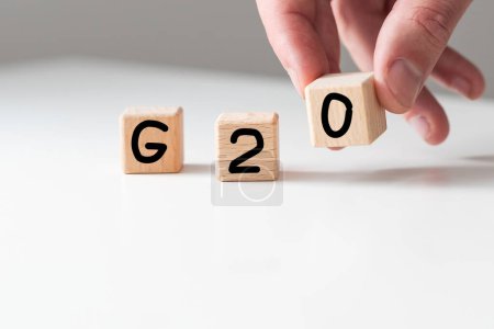 Photo for Rating, award, Cover design in natural concept with a number cube on sand background. G20 High quality photo - Royalty Free Image