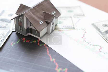 Photo for Housing market concept image with graph and toy house. High quality photo - Royalty Free Image