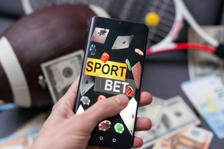 Photo for American Football Player. Sports betting on american football. Bets in the mobile application - Royalty Free Image