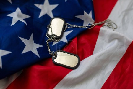 Soldiers token on American flag background. High quality photo