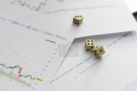 Photo for Dices cubes with the words SELL BUY on financial downtrend chart graph. Selective focus. High quality photo - Royalty Free Image