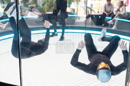 Photo for Vertical. Man controls the body in the air. Skydiving for active people. High quality photo - Royalty Free Image