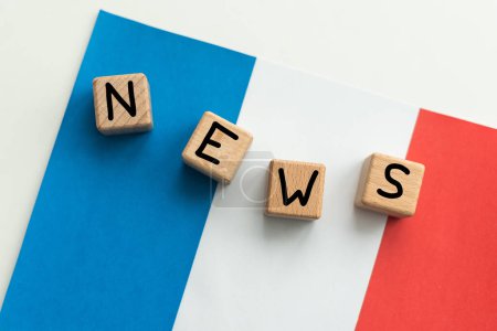 concept news feeds - Breaking news, French countrys flag, blackboard and the text Latest News on wooden background. High quality photo
