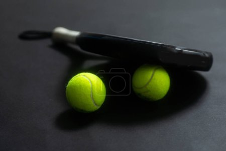 ball racket paddel black background. High quality photo