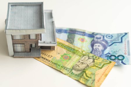 Photo for Little house model with many dollar banknotes and keys. Real estate insurance. Investment. High quality photo - Royalty Free Image