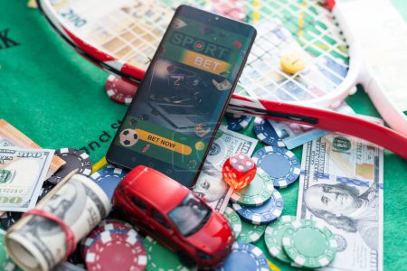 Foto de Betting on a smartphone on the background of the casino. Bets, sports betting, bookmaker. High quality photo - Imagen libre de derechos