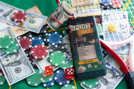 Online casino. Online poker. On the table there are game pieces and dice next to the keyboard. Game chips for betting in gambling. Dice. Poker chips. High quality photo