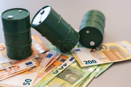 Photo for Oil barrel with money, euro banknotes closeup. High quality photo - Royalty Free Image
