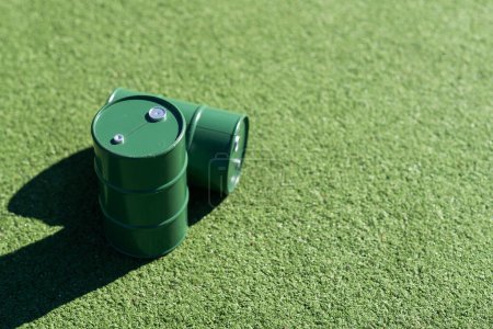 oil barrels on green background. High quality photo