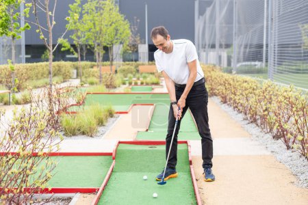 Photo for Minigolf player detail on green grass. High quality photo - Royalty Free Image