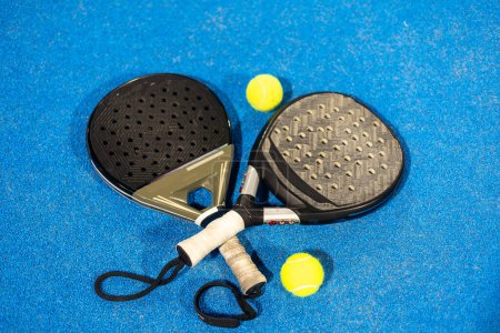 padel tennis racket sport court and balls . High quality photo