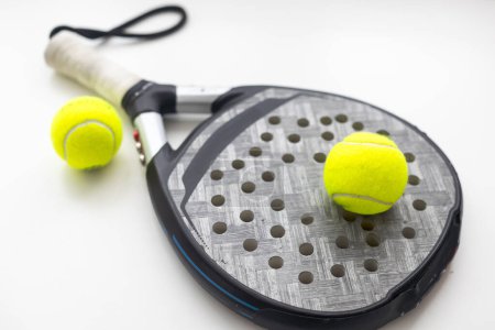 blue professional paddle tennis racket isolated on white background. portrait sport theme poster, greeting cards, headers, website and app. High quality photo