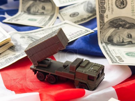 toy military vehicle and usa flag, money. High quality photo