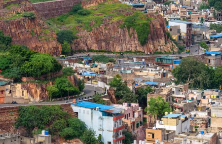 Photo for August 23 2022: View of City Road with Buildings of Jodhpur, Rajasthan, India, Foreground and Background is Blurred. Selective Focus is used. - Royalty Free Image