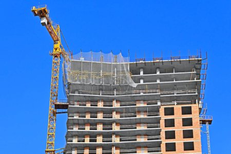 Photo for Monolithic construction site with crane and sky - Royalty Free Image