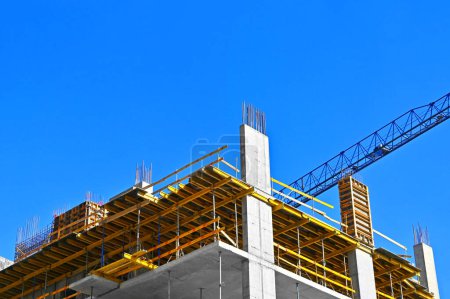 Construction site with formwork and blue sky