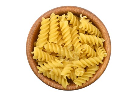 Pasta in wooden bowl, isolated on white background