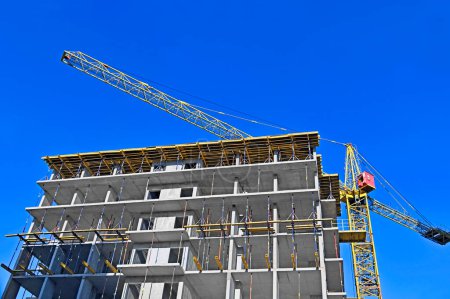 Photo for Multistage construction site with crane and sky - Royalty Free Image