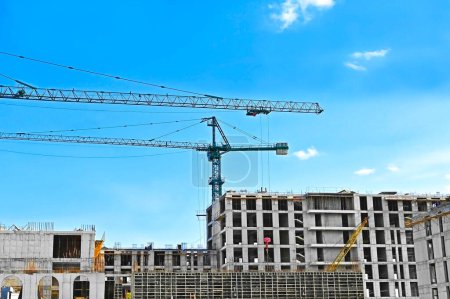 Photo for New building construction site work with tower cranes - Royalty Free Image