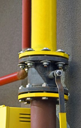 Shut-off gas valve on rusty iron pipeline