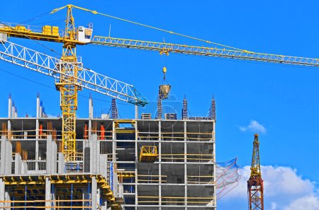 Photo for Building construction site with crane and blue sky - Royalty Free Image