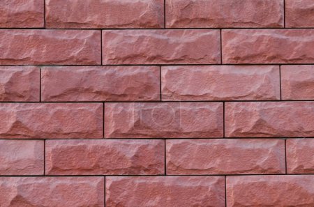 Decorative brick wall background from red tile